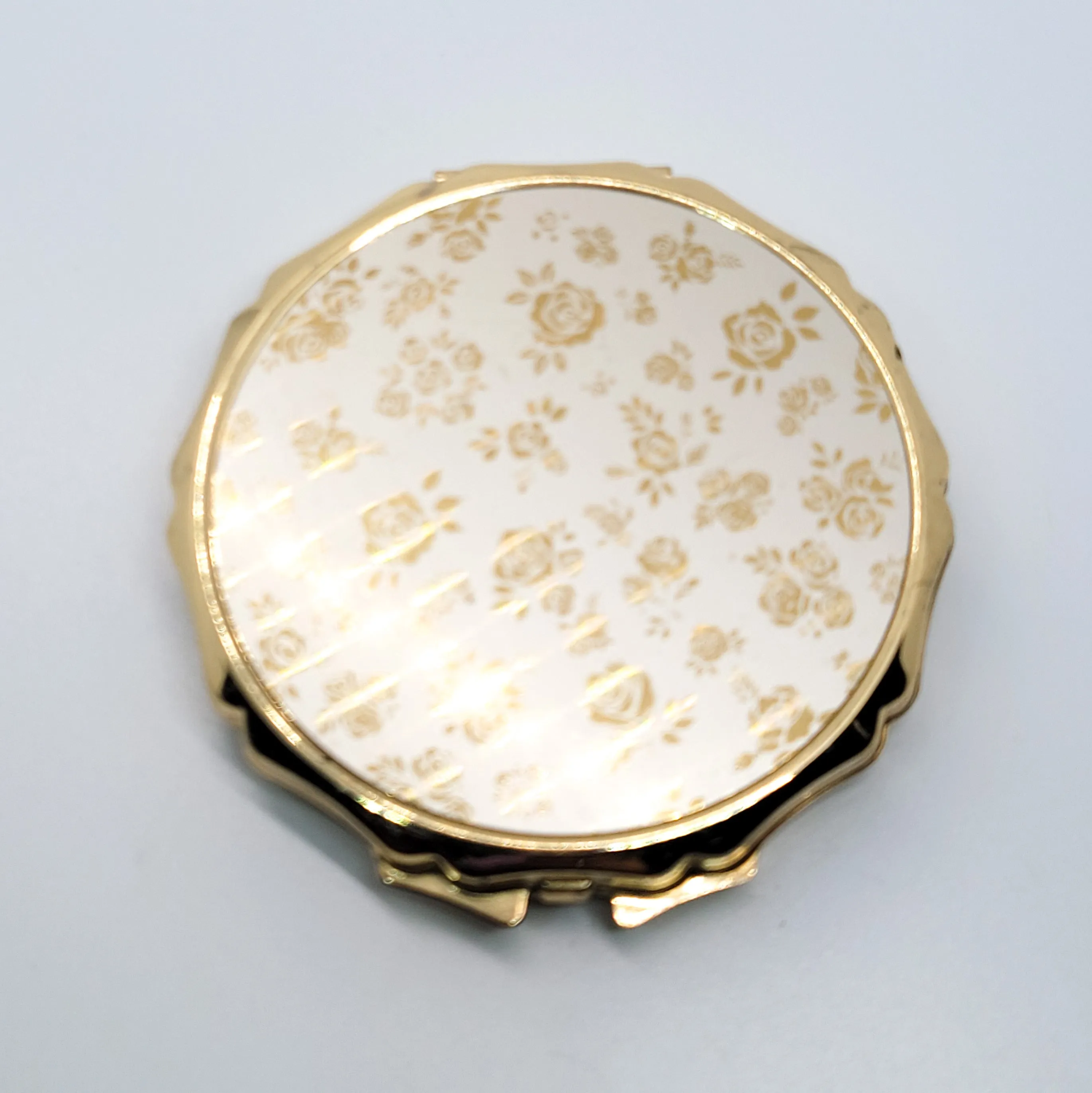 Dancing roses gold toned champagne Made in Japan vintage powder compact mirror