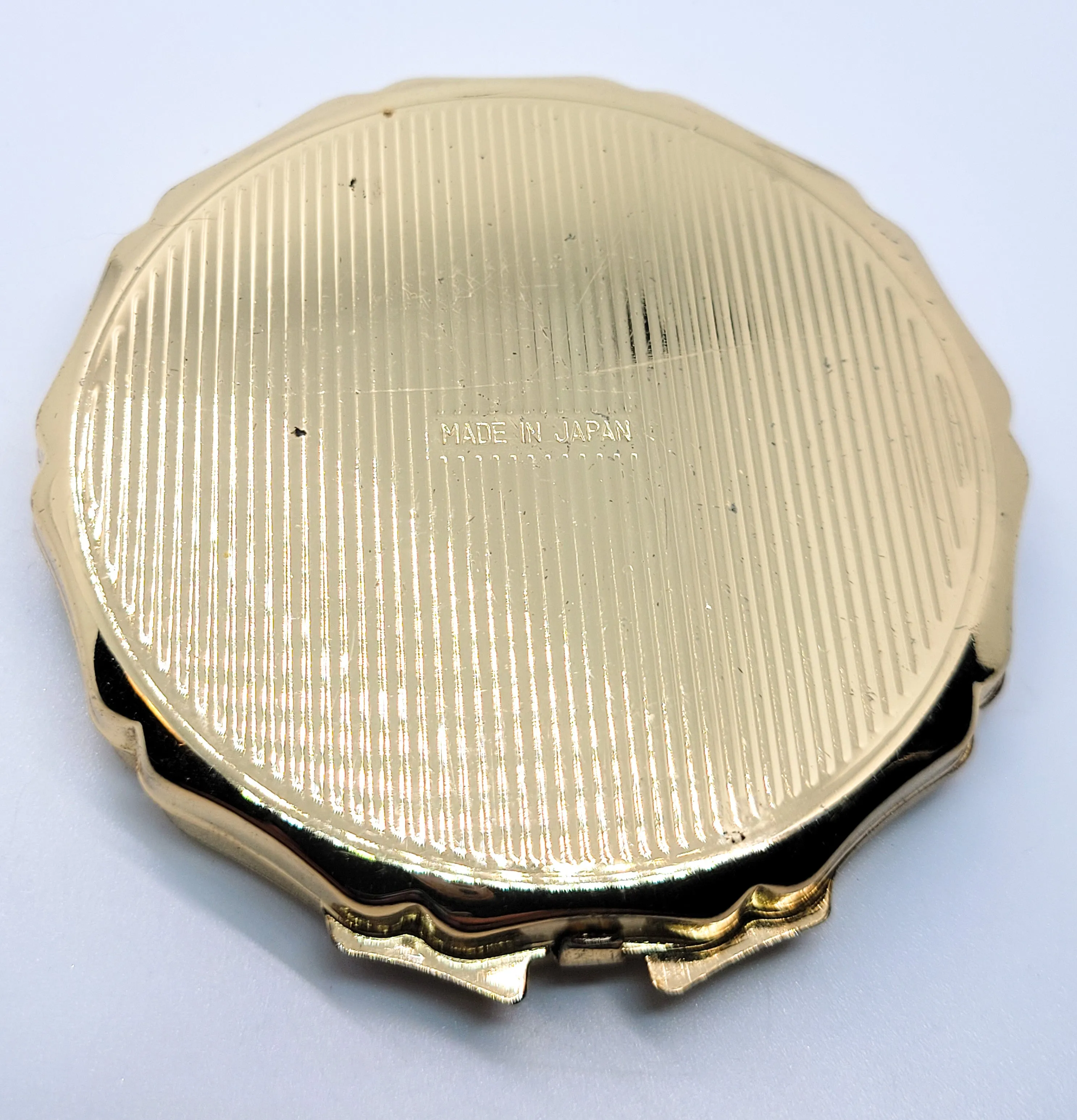 Dancing roses gold toned champagne Made in Japan vintage powder compact mirror
