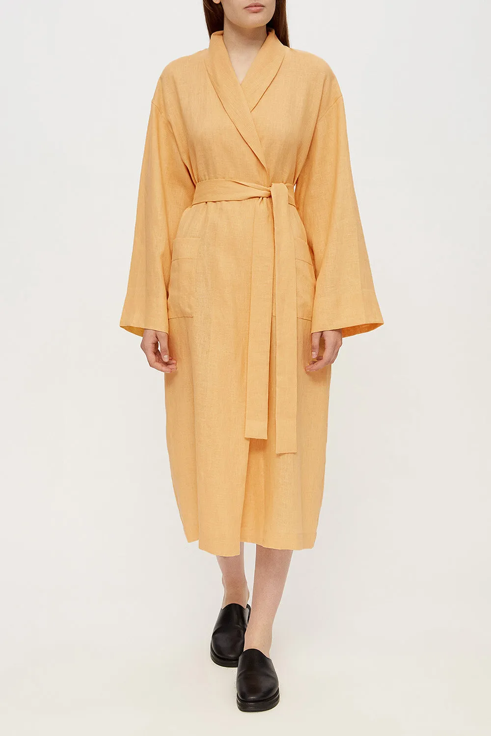 Female linen robe in ochre