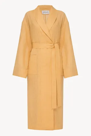 Female linen robe in ochre