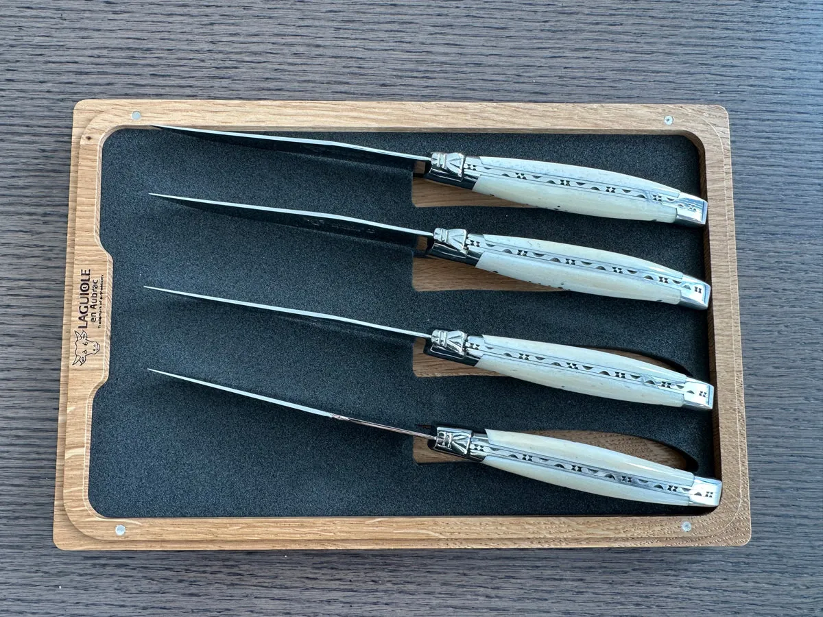 Laguiole en Aubrac Handcrafted 4-Piece Steak Knife Set with Zebu Bone Handles, Polished Bolsters