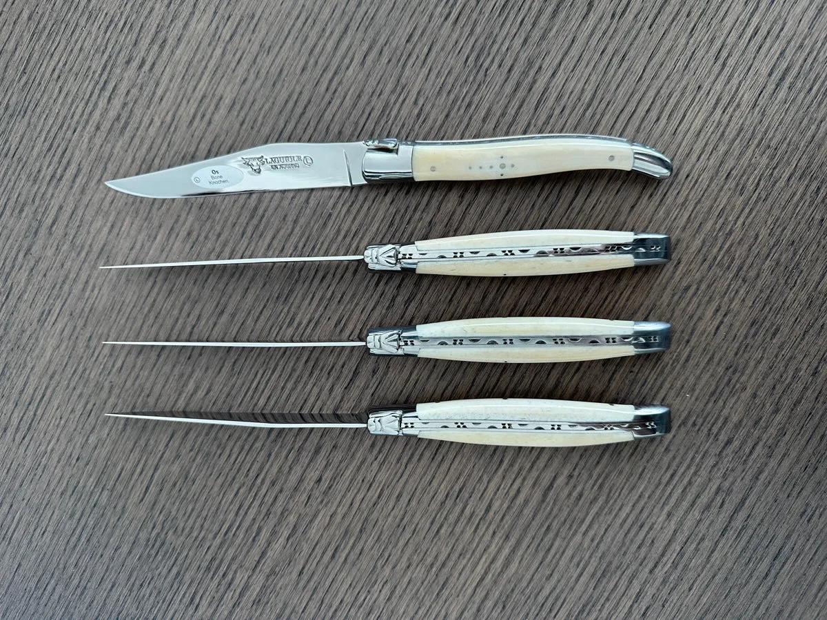 Laguiole en Aubrac Handcrafted 4-Piece Steak Knife Set with Zebu Bone Handles, Polished Bolsters
