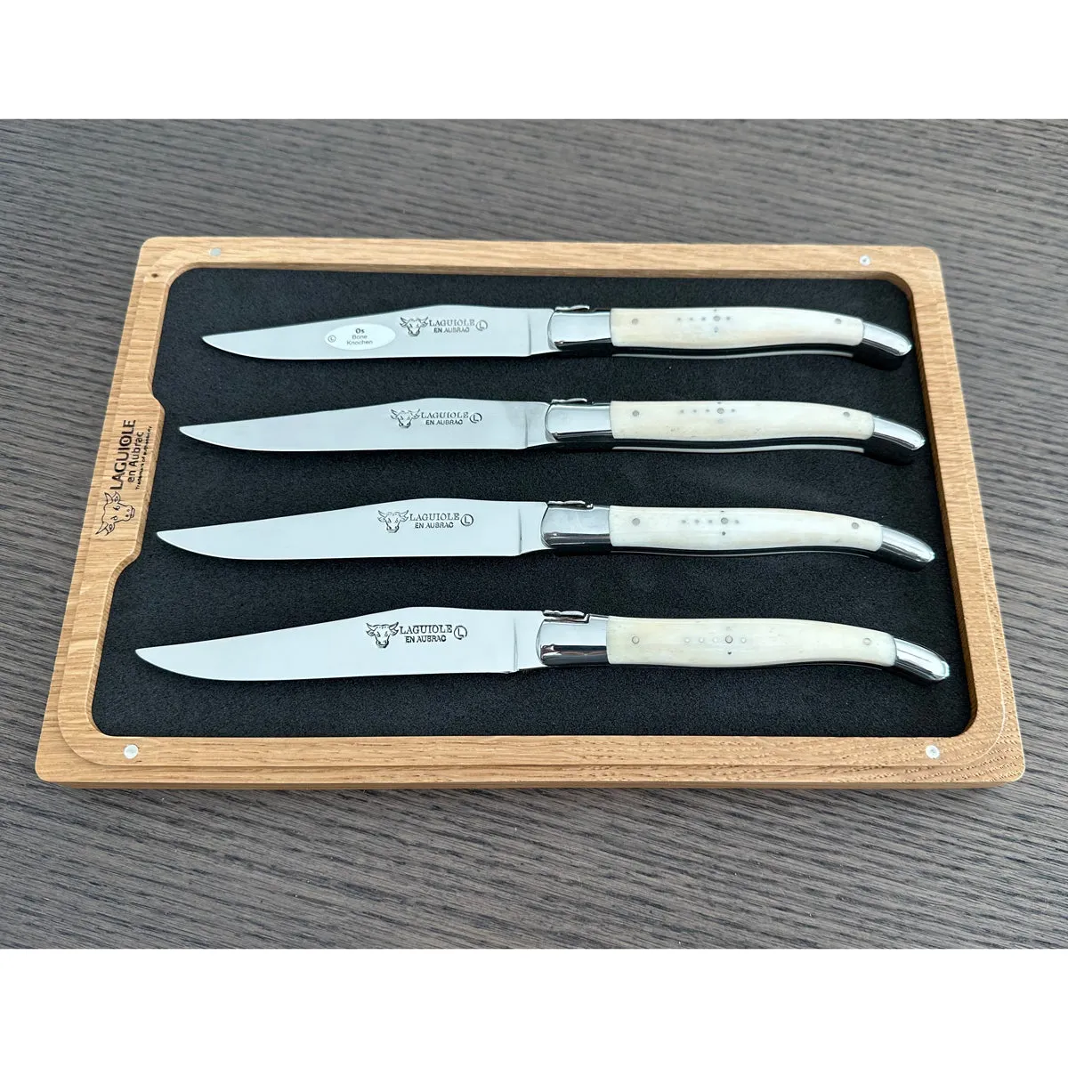 Laguiole en Aubrac Handcrafted 4-Piece Steak Knife Set with Zebu Bone Handles, Polished Bolsters