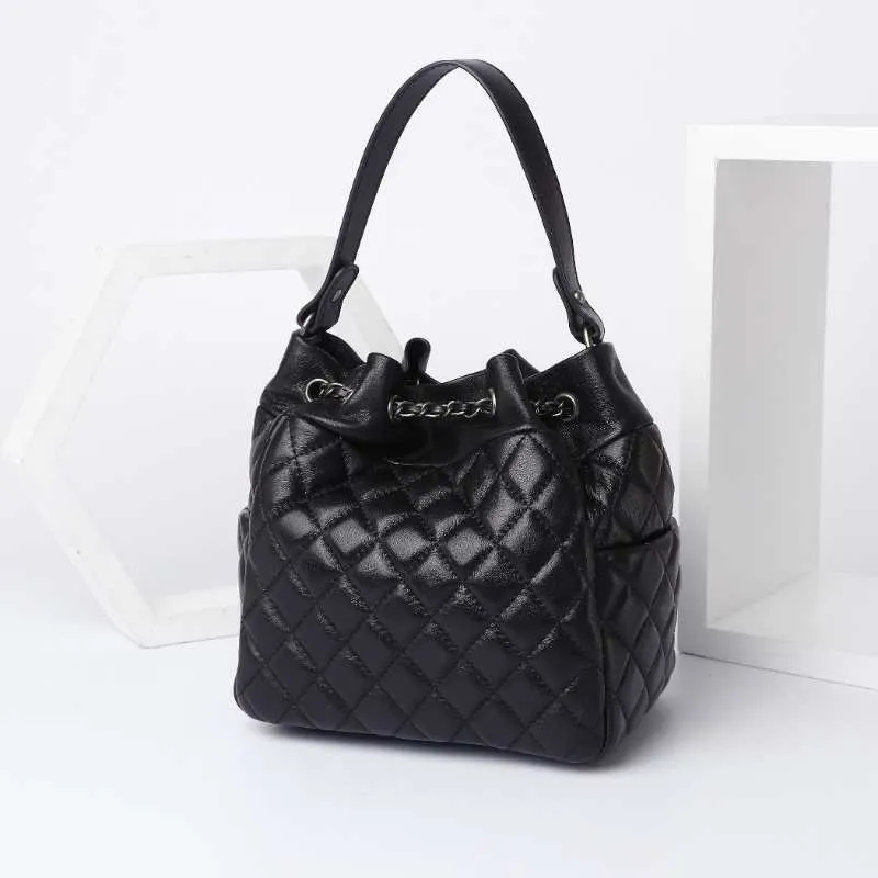 Metal chain Drawstring woman bucket bag real leather women handbags casual