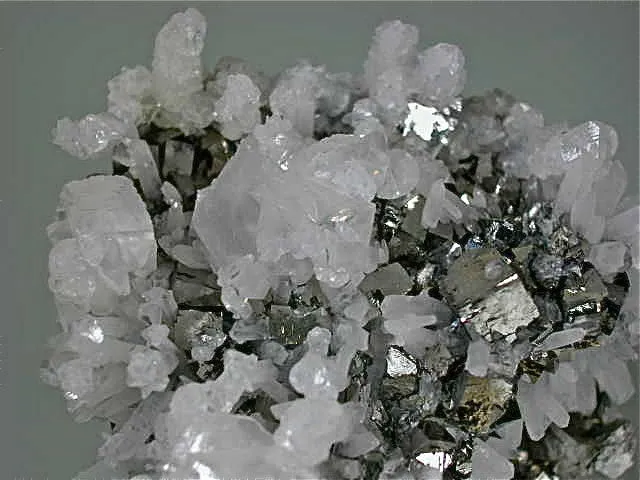 SOLD Calcite and Quartz on Arsenopyrite, Trepca Complex near Mitrovica, Kosovska Municipality, Kosovo, Mined 2015, Miniature 2.5 x 5.0 x 7.5 cm, $80.  Online 5/29/15.