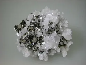 SOLD Calcite and Quartz on Arsenopyrite, Trepca Complex near Mitrovica, Kosovska Municipality, Kosovo, Mined 2015, Miniature 2.5 x 5.0 x 7.5 cm, $80.  Online 5/29/15.