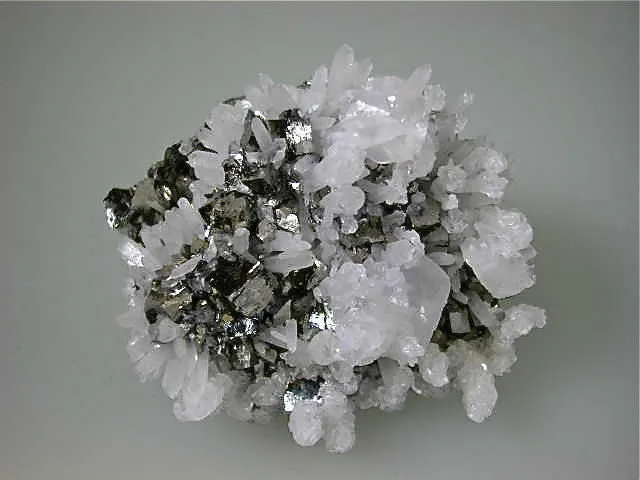 SOLD Calcite and Quartz on Arsenopyrite, Trepca Complex near Mitrovica, Kosovska Municipality, Kosovo, Mined 2015, Miniature 2.5 x 5.0 x 7.5 cm, $80.  Online 5/29/15.